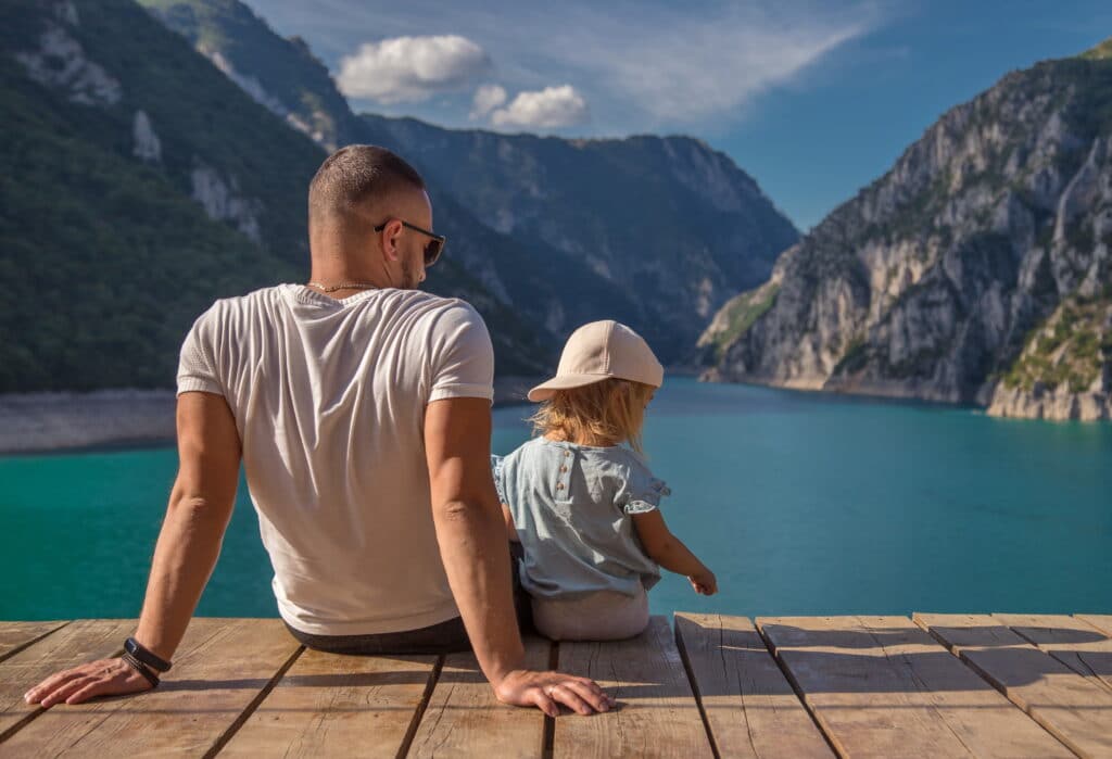 family in the mountain on summer